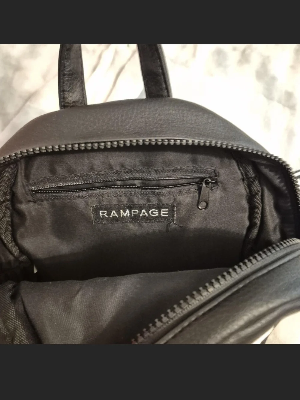 Rampage Black Mini Backpack with White Logo Accent
